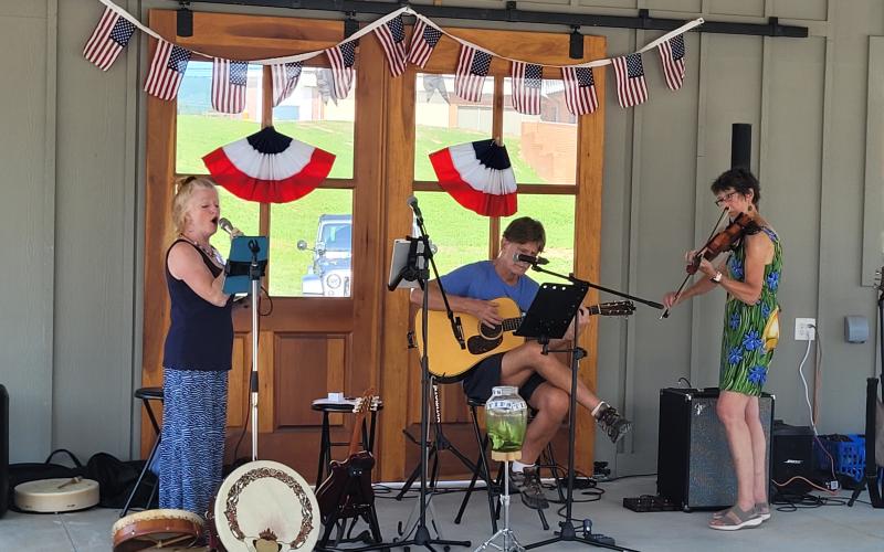 Megan Broome/The Clayton Tribune. Rainbows End perform live music throughout the evening during the Fourth Annual Rabun County Democrats Blue BBQ on July 23.