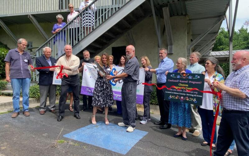 Submitted photo. Ribbon is cut for Choices Pregnancy Center on Main Street in Clayton.