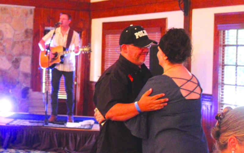 Megan Broome/The Çlayton Tribune. Tim and Tonya Steen traveled to The Dillard House from Anderson, S.C., to celebrate Independence Day. The couple dances to live music performed by “American Idol” Season 17 contestant Clay Page.