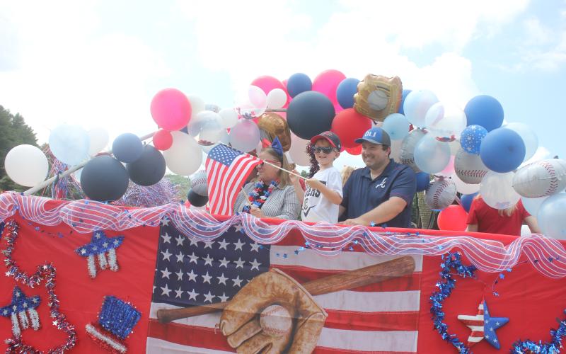 Megan Broome/The Clayton Tribune.  Sky Valley residents and visitors show their American pride during Sky Valley’s annual Grand Parade July 2.