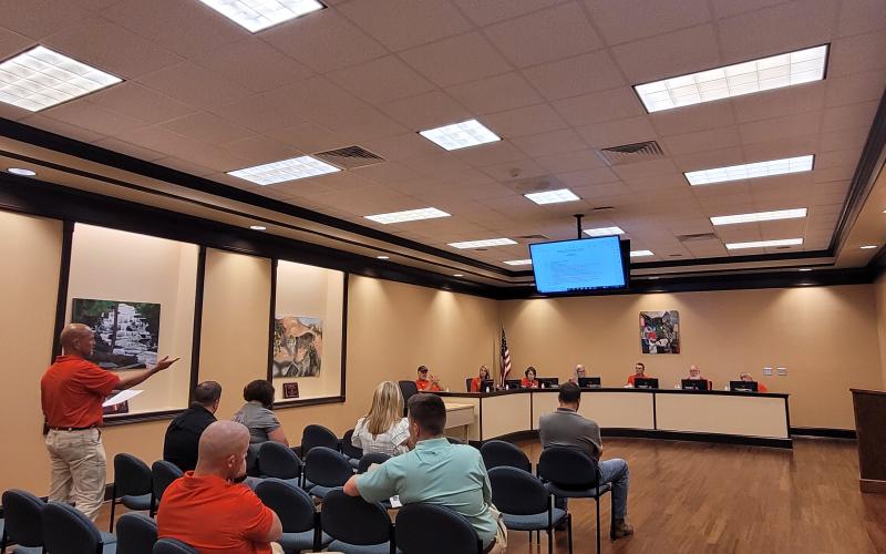 Megan Broome/The Clayton Tribune. Scott Crane, safety coordinator for Rabun County Schools, addresses Board of Education members at the July 21 meeting to go over safety protocols for the upcoming school year.