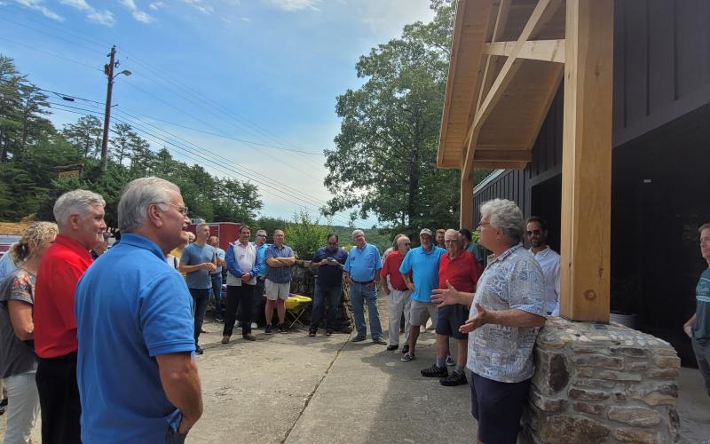 Megan Broome/The Clayton Tribune. Bill Turk, owner of Tallulah Adventures, talks to Rotarians about the different activities and facilities available at its club meeting that was held there July 21.