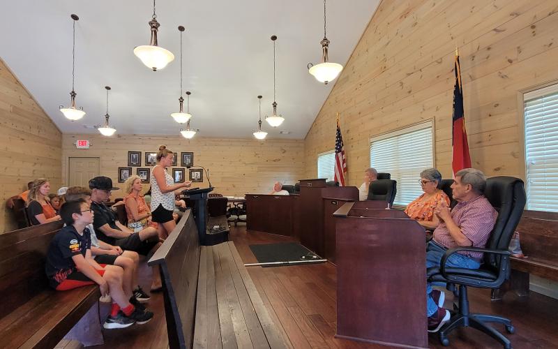 Megan Broome/The Clayton Tribune. Tiger City Council members listen to April Biagioni at last month's meeting.