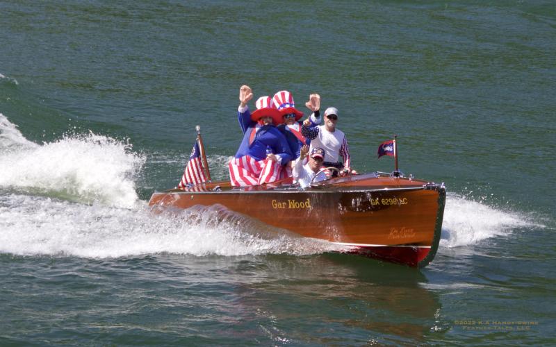 Photo courtesy of KA Hamdy-Swink. The “Loon” 1940 GarWood Double Cockpit 19’ owned by Kirk and Kathy Knous set sail during the annual Wooden Boat Parade on Lake Rabun.