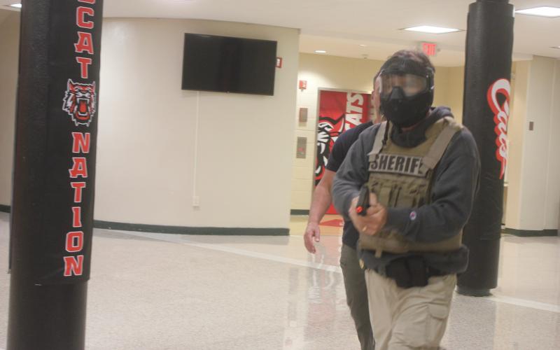 Megan Broome/The Clayton Tribune. Deputies participate in active shooter response training at Rabun County Schools last week to prepare for the return of students to school August 5.