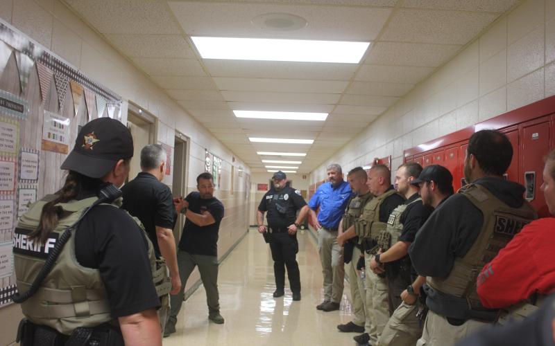 Megan Broome/The Clayton Tribune. Law Enforcement Officers received training to remain proficient in firearms, building clearing and incident response measures in the event of an active shooter at Rabun County Schools and the shooting range last week. This was part of the week-long active shooter response training that happens every year in Rabun County. RCSO Deputies spent the entire summer training and preparing for students to head back to school Aug. 5.