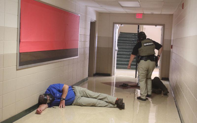 Megan Broome/The Clayton Tribune. Deputies participate in active shooter response training at Rabun County Schools last week to prepare for the return of students to school August 5.