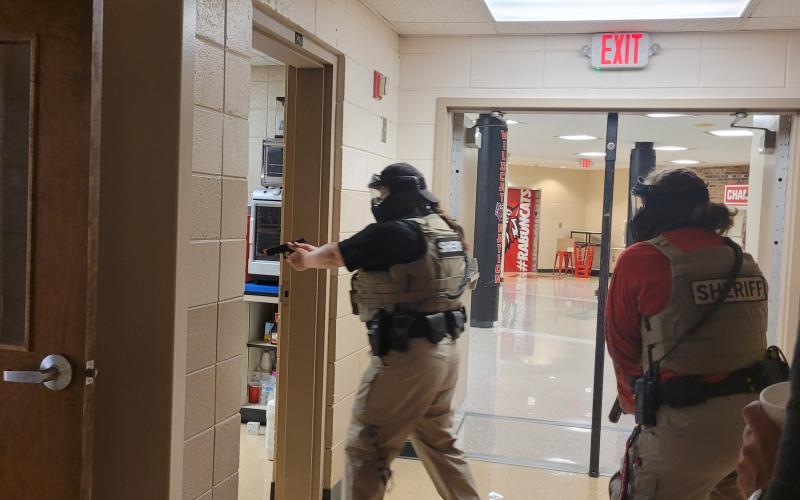 Megan Broome/The Clayton Tribune. Deputies participate in active shooter response training at Rabun County Schools last week to prepare for the return of students to school August 5.