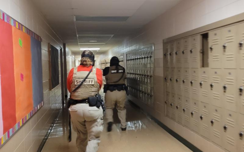 Megan Broome/The Clayton Tribune. Deputies participate in active shooter response training at Rabun County Schools last week to prepare for the return of students to school August 5.