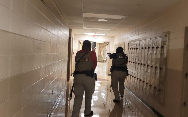 Megan Broome/The Clayton Tribune. Deputies participate in active shooter response training at Rabun County Schools last week to prepare for the return of students to school August 5.
