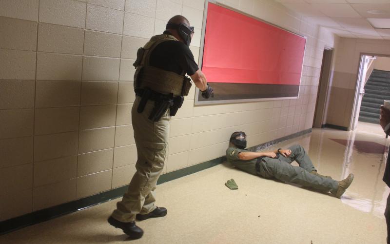Megan Broome/The Clayton Tribune. Deputies participate in active shooter response training at Rabun County Schools last week to prepare for the return of students to school August 5.