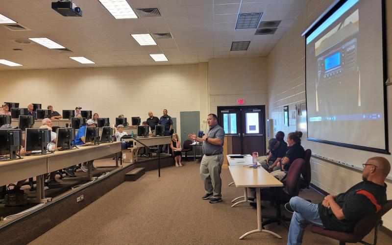 Megan Broome/The Clayton Tribune. School and emergency services officials in the county team up and educate bus drivers for safety training at the Board of Education Tuesday as part of training courses to prepare as kids go back to the classroom Friday.