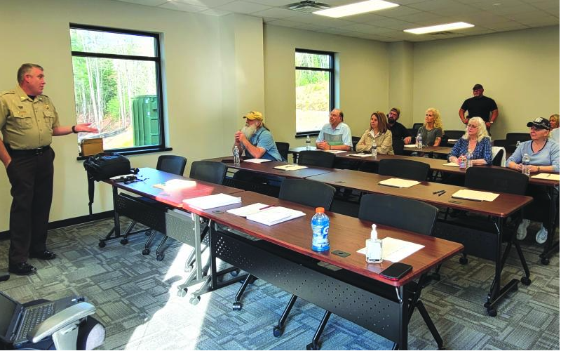 Megan Broome/The Clayton Tribune. Sheriff Chad Nichols gives a presentation of the Office of the Sheriff at the last Citizens’ Academy. The seven-week class focuses on various operations of the sheriff’s office including command staff; patrol division; detention center; Criminal Investigations Division (CID); K-9s; School Resource Deputies; and other agencies.