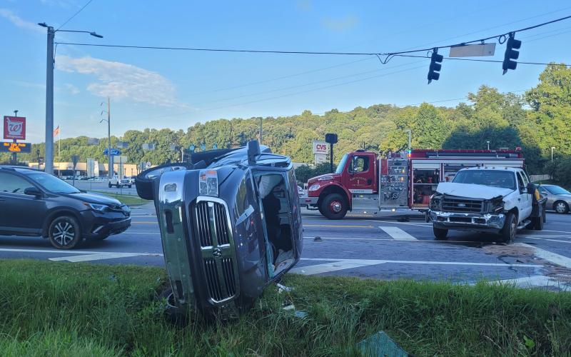 Megan Broome/The Clayton Tribune. Minor injuries were reported in a three-vehicle crash near Highway 76 East in Clayton Aug. 3. First responders had to break the windshield of a Ram 1500 to rescue a victim, according to first responders on scene.