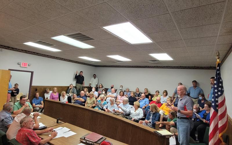 Megan Broome/The Clayton Tribune. Matt Mitcham addresses Rabun County Planning and Zoning Board members last month about rezoning concerns of 5.45 acres of land on Bridge Creek Road from Agricultural (A) to Specific Purpose (SP) for the development of storage units for boats, RV and self-storage.