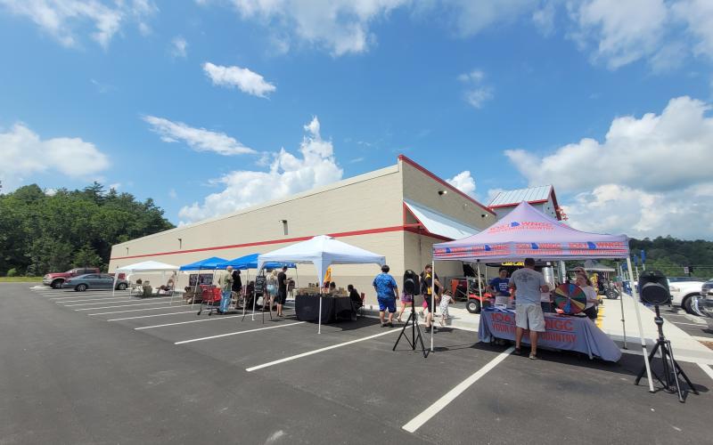 Megan Broome/The Clayton Tribune. Tractor Supply, Co. extended its Grand Opening last weekend as Rabun County Paws 4 Life held an adoption event at the store August 6. Local vendors and a booth supporting Veterans were also set up outside the store on Saturday. The Grand Opening and Ribbon Cutting event with Forward Rabun and the Rabun County Chamber of Commerce was held on July 29.