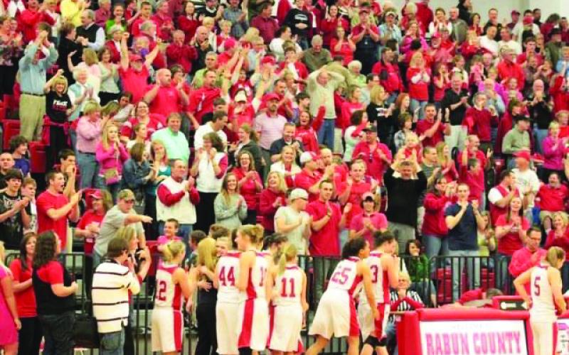 Submitted photo. A standing room-only crowd enthusiastically responds to the Lady Cats in the region tourney of 2011.