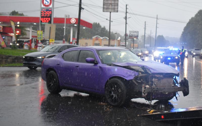 Megan Broome/The Clayton Tribune. This purple 2010 Dodge Charger was involved in a two-vehicle crash in Clayton Sunday, September 4.