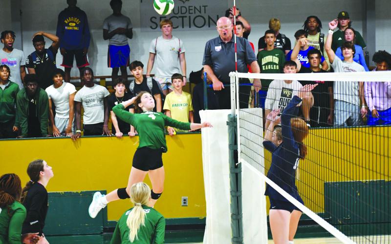 Luke Morey/The Clayton Tribune. Freshman Cassidy Klimasewski goes up for a kill against Asheville School. The Eagles fell 0-3 to Asheville. Klimasewski won the RGNS player of the week.