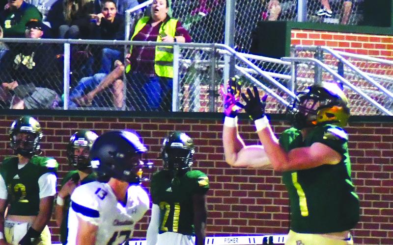 Enoch Autry/The Clayton Tribune. Junior Trey Horne catches the Eagles’ first touchdown of the night over Brady Wright. Horne has four receiving touchdowns on the year.