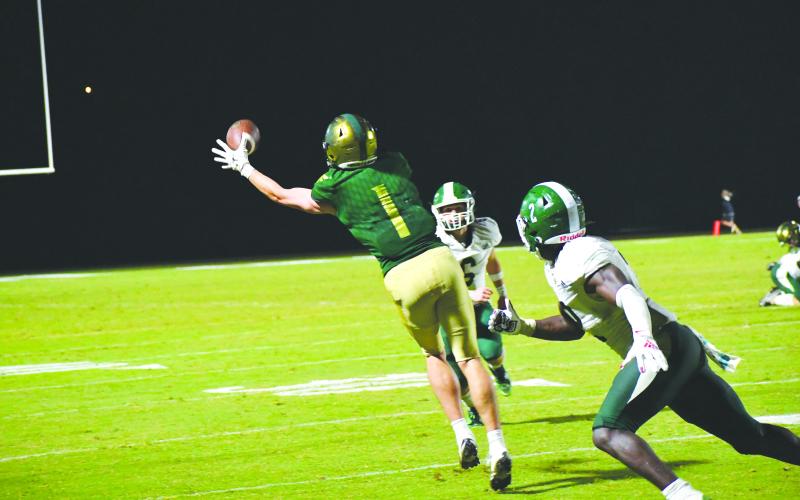 Luke Morey/The Clayton Tribune. Rabun Gap junior Trey Horne hauled in a one-handed catch that he took to the house for the game-winning touchdown.