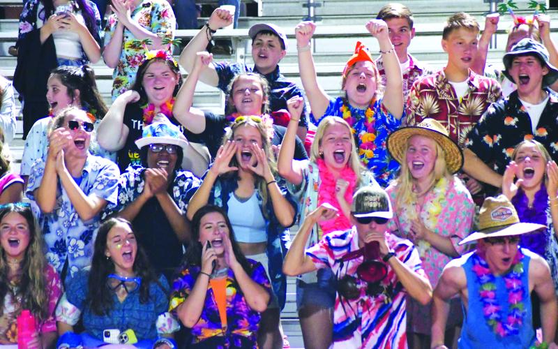Enoch Autry/The Clayton Tribune. The Rabun County High School student body wears colorful Hawaiian clothes during the Wildcats’ win over visiting Adairsville on Sept. 2