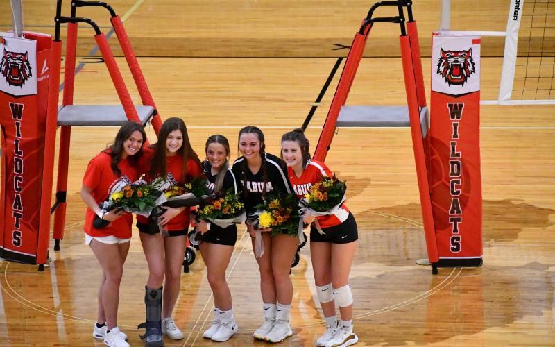 Luke Morey/The Clayton Tribune. RCHS honored their five volleyball seniors on Tuesday night. From left to right, manager Bailey Maloney, Caroline Bahin, Ashley Slappey, Allana Jones, and Abbye Carver.