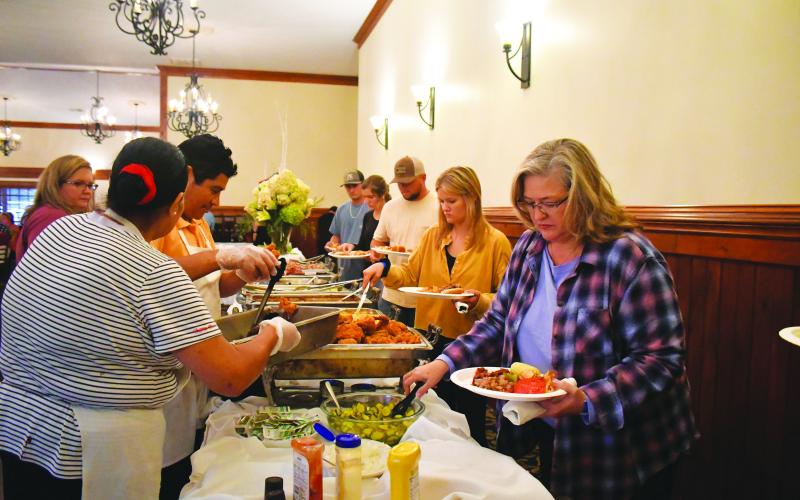Megan Broome/The Clayton Tribune. Crowds of people enjoyed a BBQ cookout at The Dillard House Sept. 4 during Labor Day weekend. The cookout included BBQ, fried chicken, ribs, hotdogs and all the fixings and an extravagant dessert bar.
