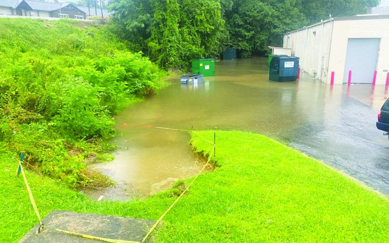 0: Photo courtesy of James Brim. Severe flooding occurred throughout Rabun County over the weekend as many areas were met with torrential downpours and rain events. The Germany Valley Weather Station reported 6.15 inches of total rainfall through the holiday weekend. Pictured is flooding in the parking lot of the Food Bank of Northeast Georgia. Below: Photo courtesy of Wanda Roe. Wanda Roe documents Warwoman Creek flooding Earl’s Ford.