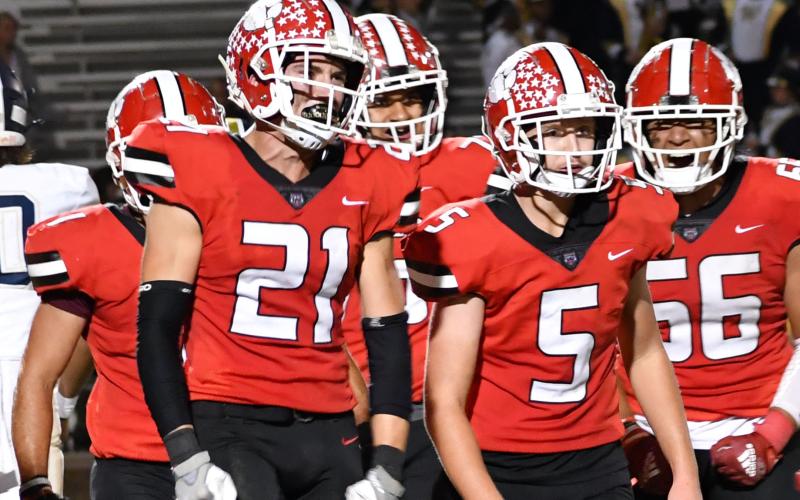 Luke Morey/The Clayton Tribune. Junior Paul Piccioti (21) celebrates a sack against Whitefield Academy with his Wildcat teammates during Rabun County’s 28-14 home win on Sept. 23. Piccioti has been a consistent presence in the backfield this season with 5.0 tackles for a loss and three sacks, as well as 30 total tackles. RCHS plays at Fellowship Christian Thursday night.