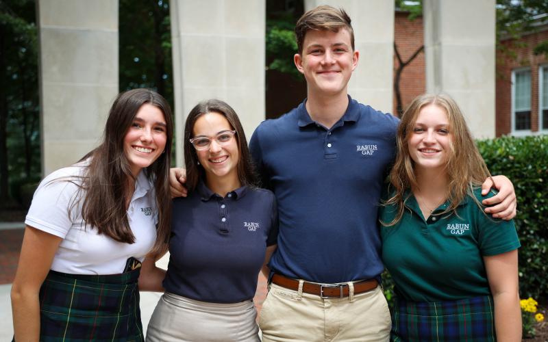 Photo courtesy of Rabun Gap-Nacoochee School. Pictured from left, Emily Cox ’23 of Rabun Gap, GA, Catherine Childs ’23 of Toccoa, Ga., Dominic Vogelbacher ’23 of Rabun Gap, Ga., and Ella Jane Dow ’23 of Clarkesville, Ga., pose for a photo on the first day of their senior year at Rabun Gap-Nacoochee School. The Class of 2023 is the largest in school history with 105 students.
