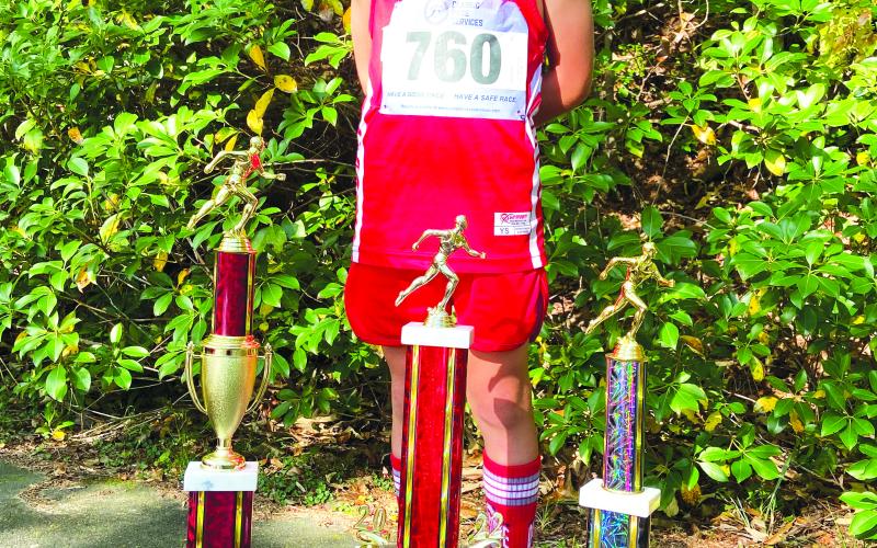 Courtesy of Ed Eidson. Kai Hanifan-Wagner, winning every meet this season, shattered the state record by 21 seconds. Last week he also earned the Highpoint championship with a perfect score of 75.