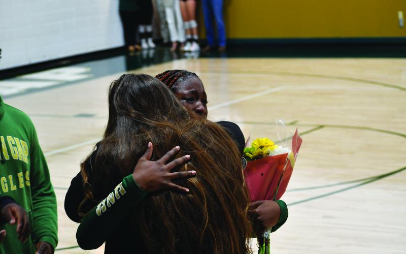 Luke Morey/The Clayton Tribune. RGNS volleyball three seniors Claren Spivey, Cheney Moriarty and Calea Jakson were honored by head coach Zoe Kennedy and Amy Westbrook on Oct. 12.