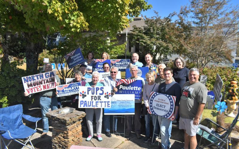 Megan Broome/The Clayton Tribune. Rabun County Democrats held a meet-and-greet community event with local party representatives and Georgia State Senate Post 50 Candidate Paulette Williams Oct. 14 at the Rock House in Clayton. The group members proudly hold campaign signs and several visitors stopped by to chat with Williams and party members about the Democrat platform and upcoming election, for which early voting is happening now.