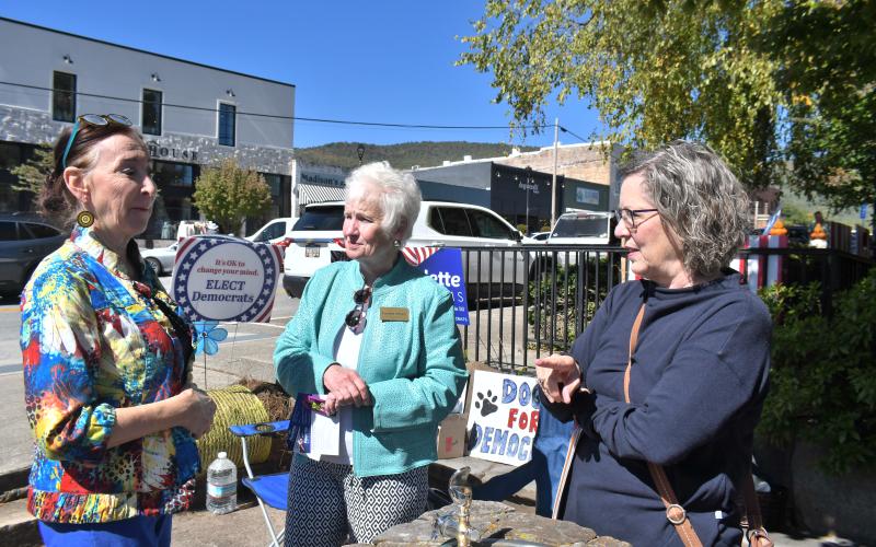 Megan Broome/The Clayton Tribune. Rabun County resident Anne Kirslis, left, and Laura Hart, chair of the Rabun County Democrats, meet with Georgia State Senate Post 50 Candidate Paulette Williams, center, at the Rock House in Clayton Oct. 14.