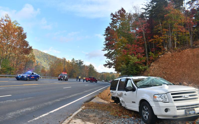 Megan Broome/The Clayton Tribune. First responders work the scene of a two-vehicle crash on Ga. 15 at Pinnacle Drive in Clayton October 17. This 2008 Ford Expedition was struck by a 2011 Nissan Altima when the driver of the Altima, a 20-year-old Valrico, Florida man, failed to maintain the lane of travel. Possible minor injuries were reported.