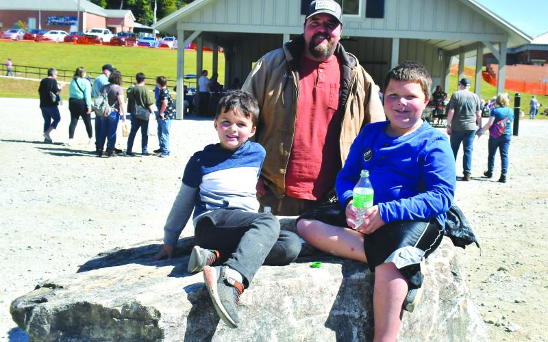 Megan Broome/The Clayton Tribune. : The Cunningham family traveled to Clayton from Newnan, Georgia to attend the Foxfire Mountaineer festival. Pictured are James with Bradley, 6, and Jackson, 9.