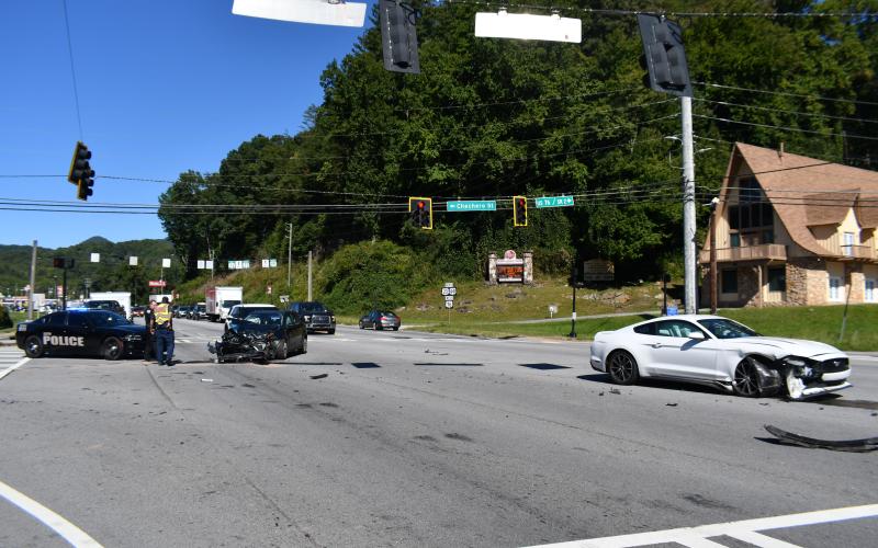 Megan Broome/The Clayton Tribune. Rabun County emergency personnel work the scene of a crash involving two vehicles that occurred on Georgia Highway 15 at Chechero Street in Clayton on Sept. 27.