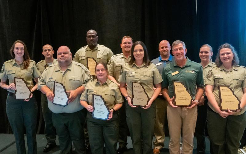 Submitted photo. Pictured are honored park and historic site managers Lieren Merz, Bud Fuller, Jason Carter, Desmond Timmons, Gretchen Greminger, Tyler Sims, Katherine Darsey, Chris Lockwood, Karl Gross, Carol Sanchez and Jamie Madden. Merz (far left) is the manager with Tallulah Gorge State Park and Tallulah Falls, which tied with Wormsloe State Historic Site for the “Retail Award.”