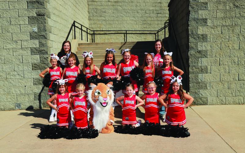 9U cheerleaders, coached by Cassidy Hughes: Ella Bone; Vivi Bradley; Lilah Brewer; Gabi Clarke; Jasmine Deason; Aria Dolan; Ruby Gaston; Ava Havens; Aiyana Perez-Roberts; Breelynn Hughes; Gisele Queen; and Layla Ramey.
