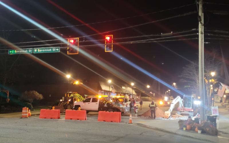 Megan Broome/The Clayton Tribune. City of Clayton workers work overnight Sunday, Nov. 13, to replace valves on Main Street in the downtown area. Workers replaced valves and a fire hydrant to improve the system. Crews worked overnight to minimize service disruption to nearby businesses.