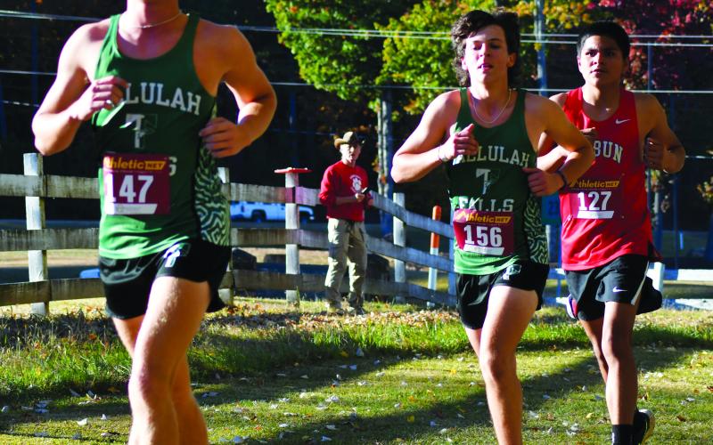 Enoch Autry/The Clayton Tribune. Tallulah Falls boys runners Jackson Shadburn and Canon Brooks help the Indians secure fourth place as a team to advance to state.