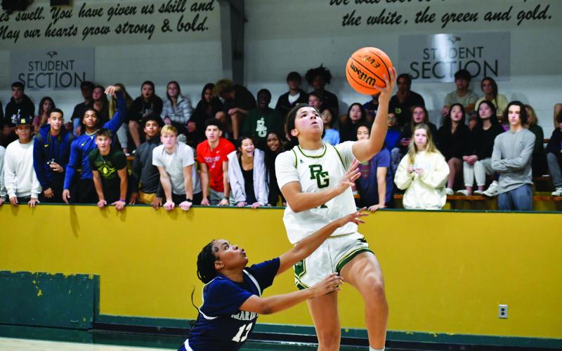 Luke Morey/The Clatyon Tribune. Senior Francesca Cergol goes up for a basket against Marietta on Wednesday night.