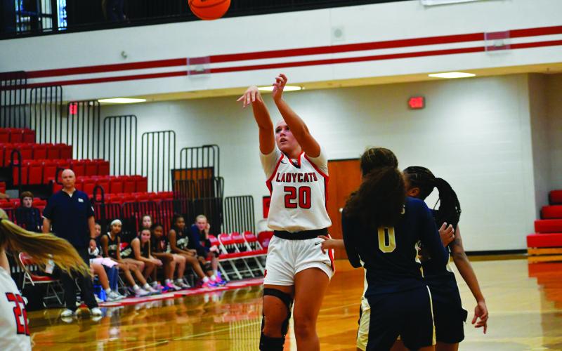 Luke Morey/The Clayton Tribune. Junior Ellie Southards goes up for a jumper against Seneca. Southards in her first game back from injury ended with 15 points and four rebounds as well as three steals.