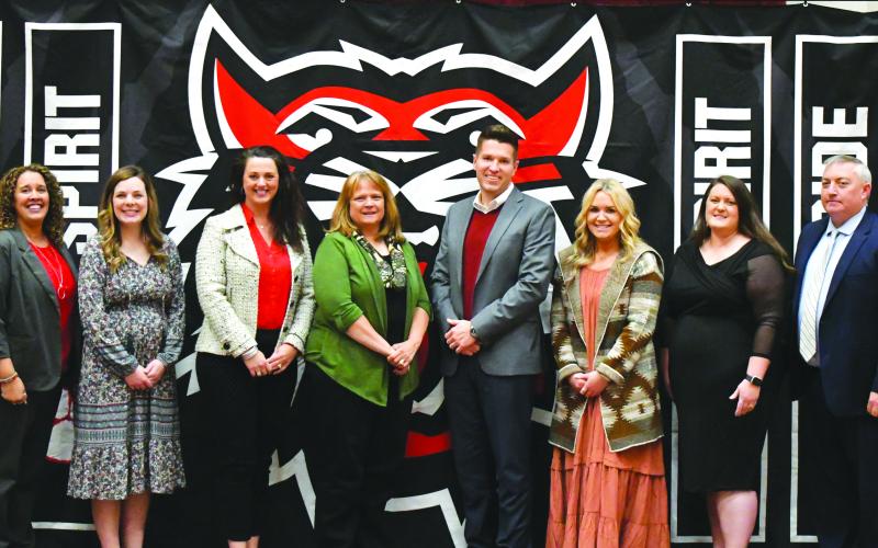 Enoch Autry/The Clayton Tribune. Pictured with their schools’ principals are this year’s four top teachers. From left are middle school principal Kechara Partin and RCMS teacher Emily Lovelady; primary principal Carla Truelove and teacher Sharon Lampros; high school principal Justin Spillers and teacher Hannah Miller; and elementary school teacher Natasha Mazarky and RCES principal Jonathan Welch. Mazarky also is this year’s system teacher of the year.