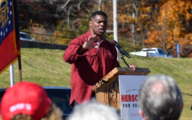 Enoch Autry/The Clayton Tribune. U.S. Senate candidate Herschel Walker speaks to crowds of people at a rally held in Dillard Oct. 26.