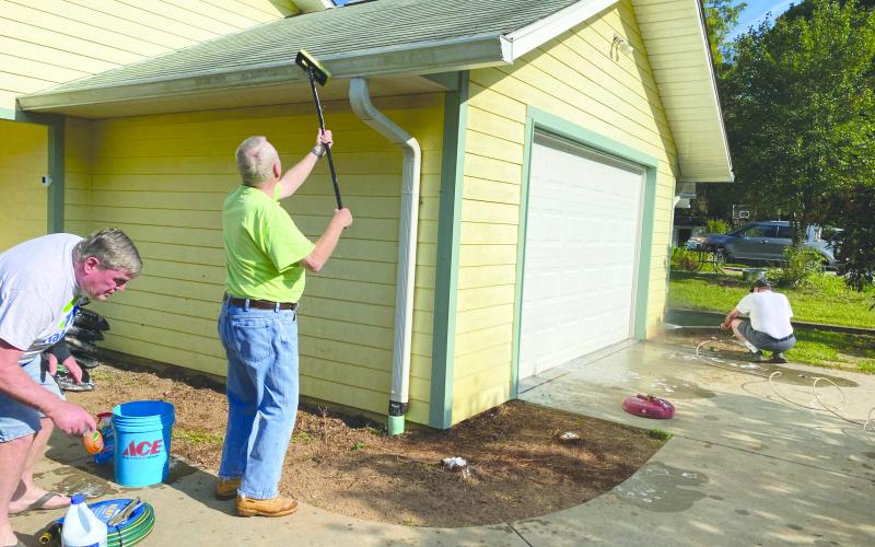 Submitted photo. Construction crews along with Dan MacAfee, Habitat Chaplain and Building Chair Ed Steil, and Jack Anderson work on the Habitat for Humanity house.