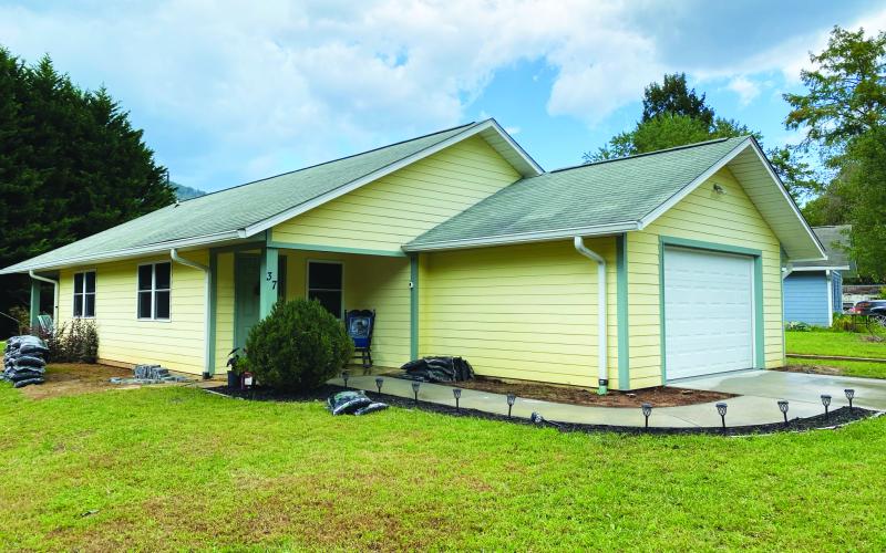 Submitted photo. Rabun County Habitat for Humanity had a blessing for its new Habitat House with community members welcoming Becky and Ayla into their new home Sunday, Oct. 30.