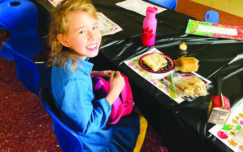 Photography courtesy of Rabun County Primary School. Kasi J Blalock prepares to partake of the RCPS meal.