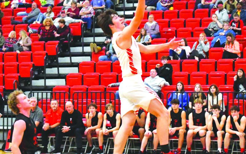 Luke Morey/The Clayton Tribune. Rabun County senior Jayton Henry finishes the fast break with a layup against Franklin on Saturday, Dec. 10. Henry led the team with a career-high 14 points, including hitting two clutch free throws with under a minute remaining in the game to give the Wildcats a lead they would not relinquish.